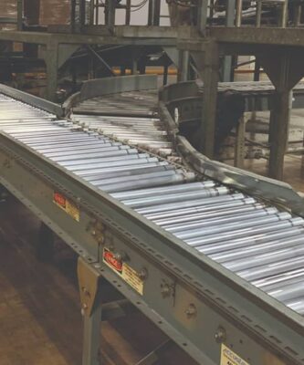 Conveyor belts going in different directions through a factory